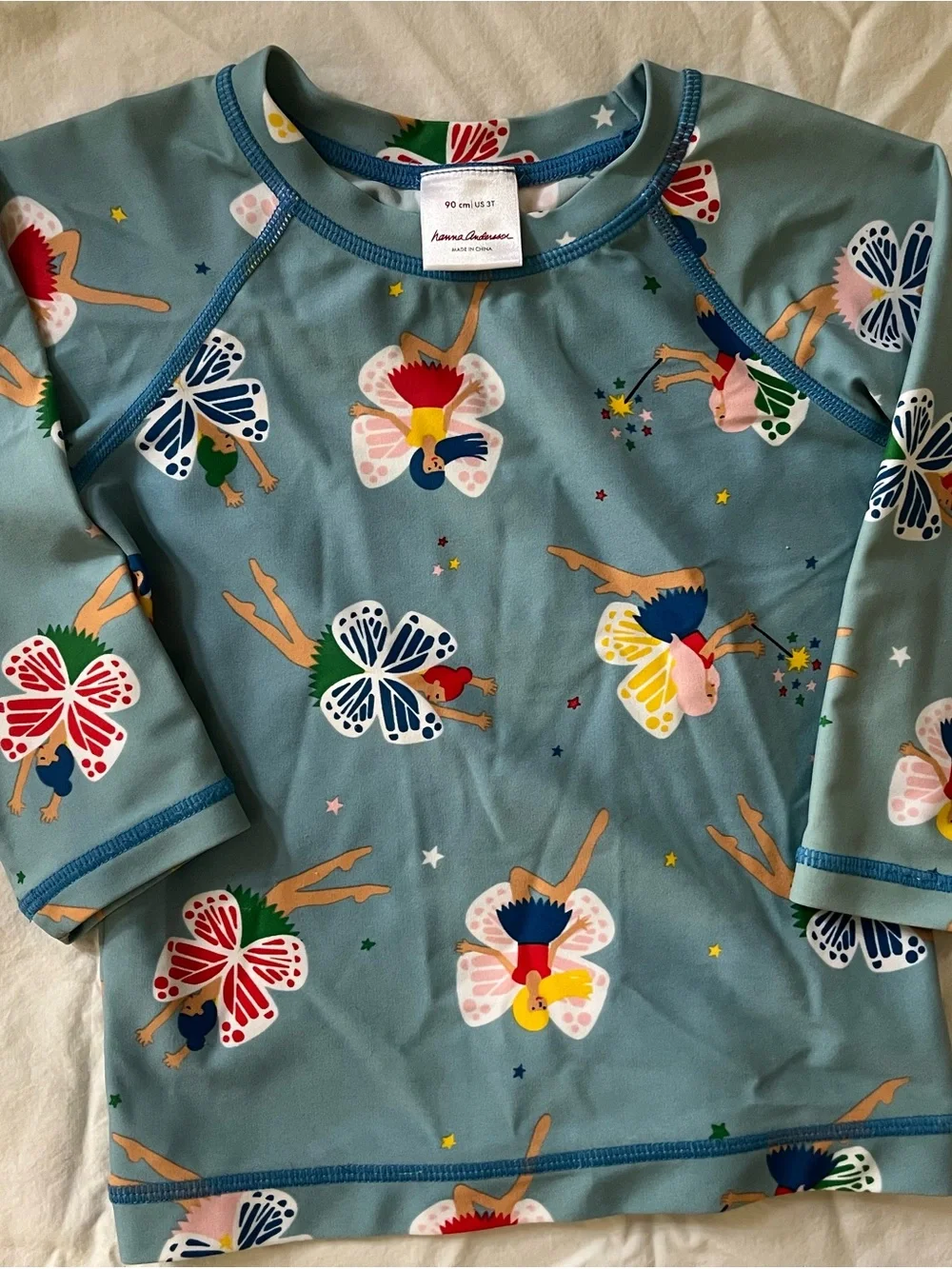 Hanna Andersson Aqua Swim Top with Multicolor Fairy Print